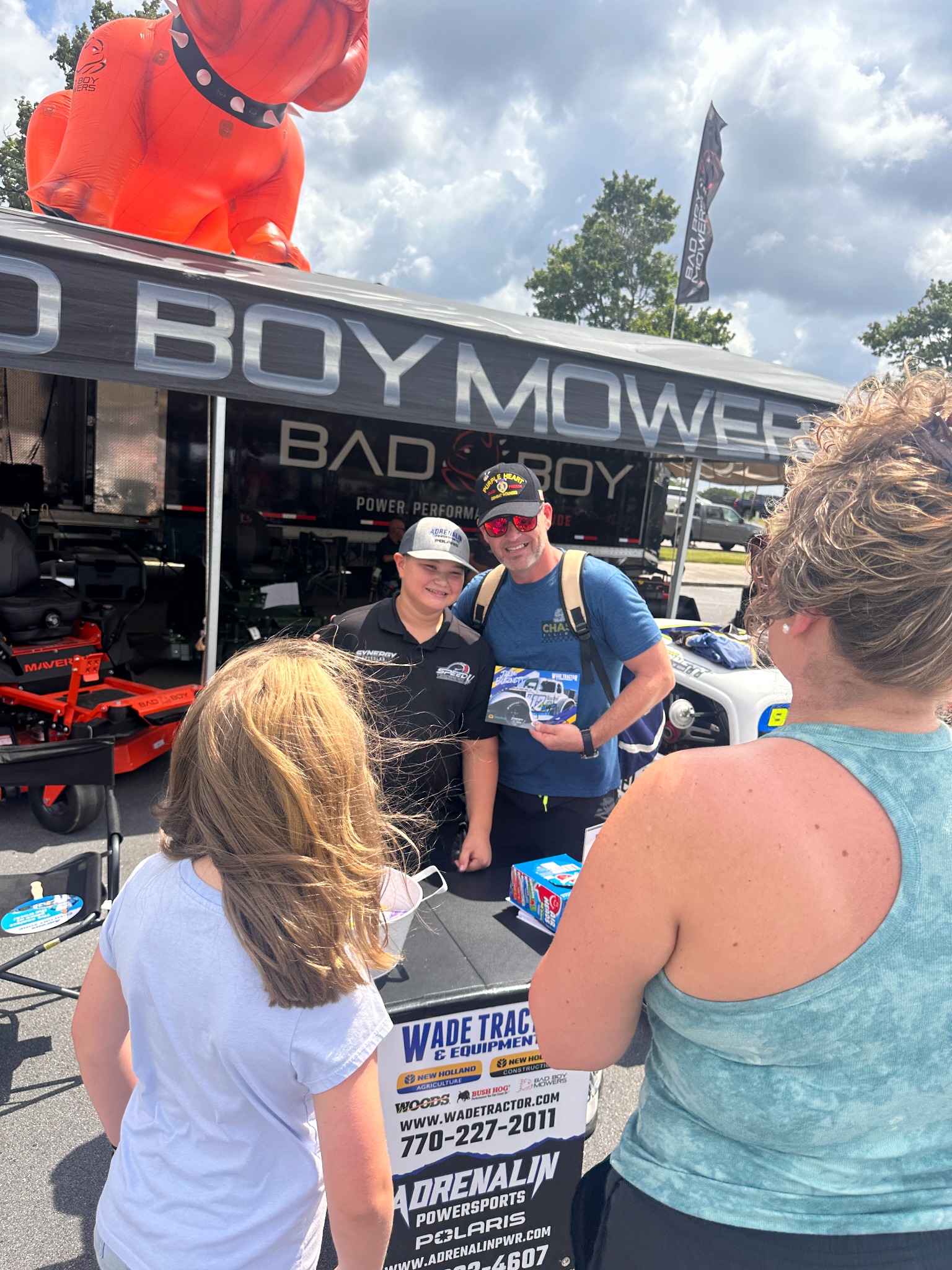 Jaxon meeting fans at a partner display