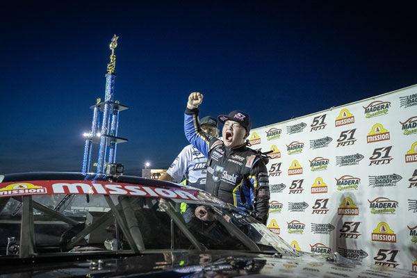 Jaxon celebrating his Junior Late Model win in Madera Speedway victory lane
